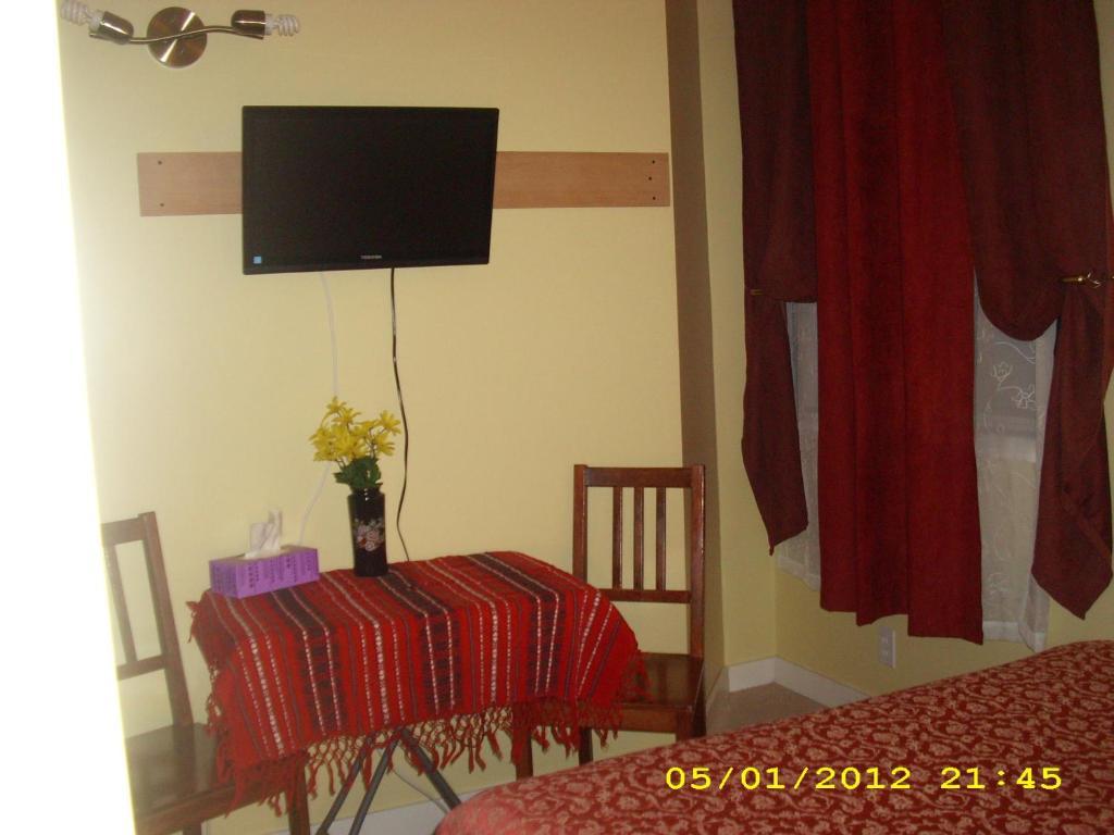 Villa Maria Country Inn Acheson Bilik gambar